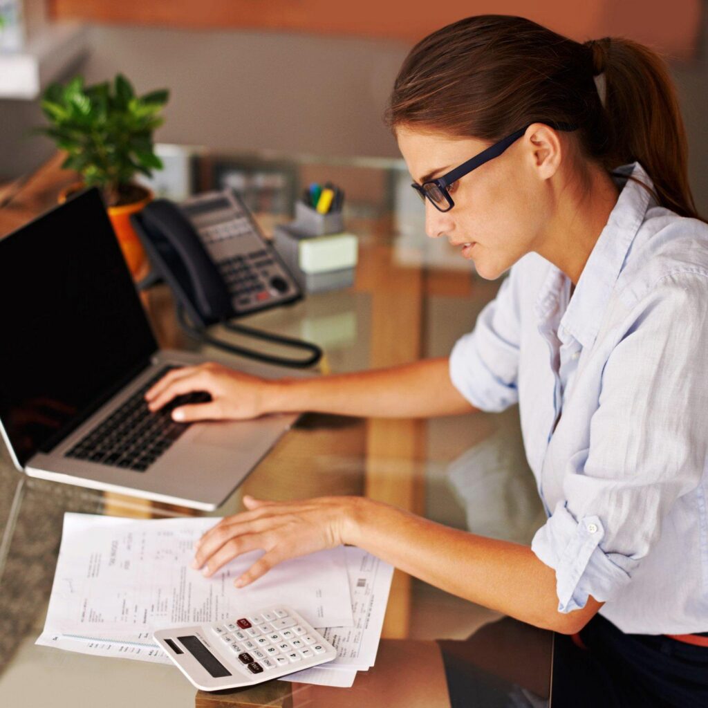 Homebuyer reviewing finances before a mortgage credit chec