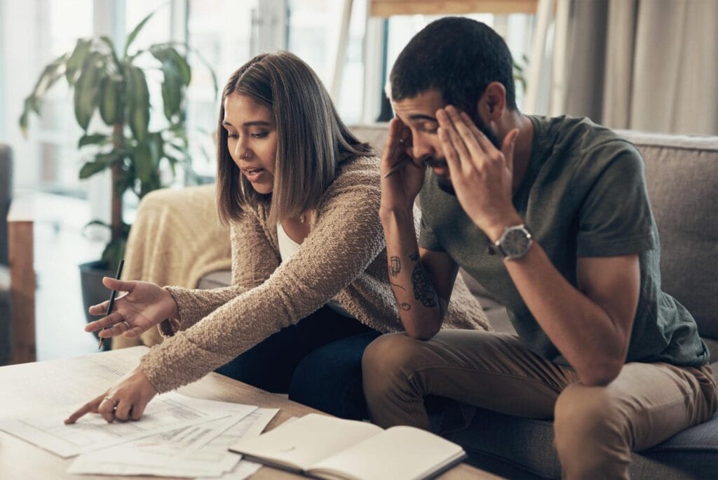 Couple reviewing finances before buying a home